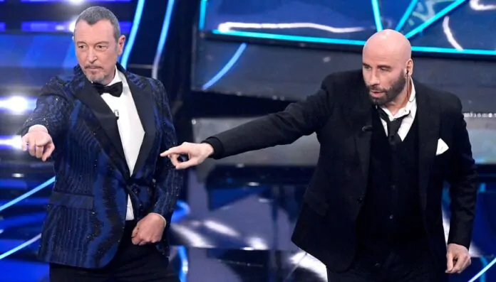 john travolta si esibisce con amadeus a sanremo 2024